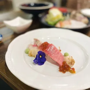 Sashimi plate in the set menu. The scallops are from Japanese, the best I've had in the US. It's just sweet, tastes like a dessert.