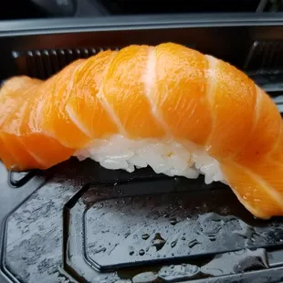 Salmon sushi; the best sushi here in my opinion. Huge slab o salmon... nice.
