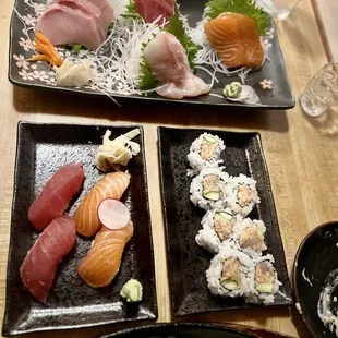 Sashimi platter, ahi and salmon nigiri . Spicy tuna roll.