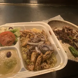 a meal in a styrofoam container