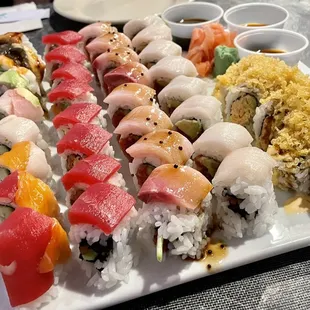 Left to right: Ultimate Rainbow Roll, Cherry Blossom Roll Special, Sakura Drop Roll, Lotus Blossom Roll Special, Famous Roll Special