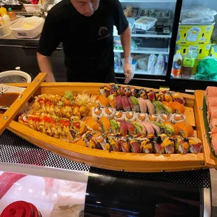 a man preparing sushi