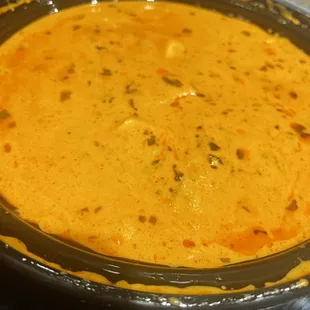 a bowl of soup on a stove