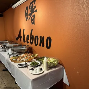 a buffet table with food on it