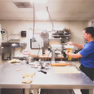 Chef preparing fresh pasta on the daily .