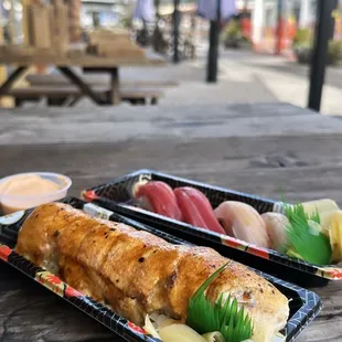 two trays of food on a table
