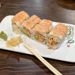 Ocean Roll - Spicy krab &amp; avocado topped with cooked shrimp, wasabi tobiko &amp; creamy wasabi sauce