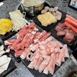 Assortment of meats, veggies and noodles