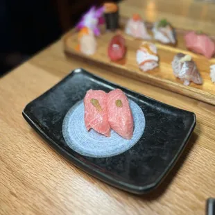 a plate of raw salmon