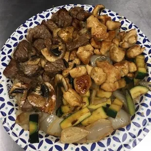 Hibachi Steak and Chicken Includes fried rice, zucchini, onions, mushrooms, and side soup or salad