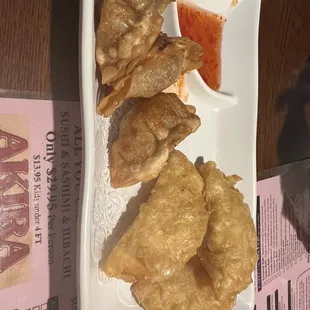 Top-fried gyoza Bottom-krab Rangoon (they're half moon shaped)