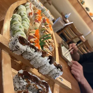 sushi on a wooden boat