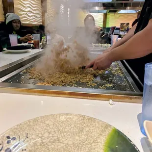 Rice being grilled ( delicious and tasty)...