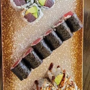 a variety of sushi on a plate