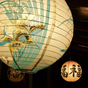 a paper lantern hanging from the ceiling