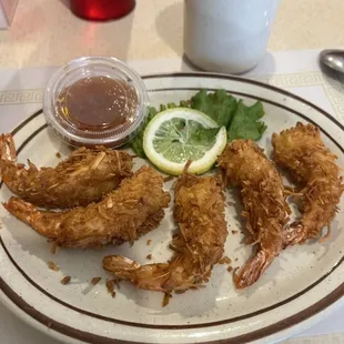 Large coconut shrimp appetizer special. Was plenty for me.