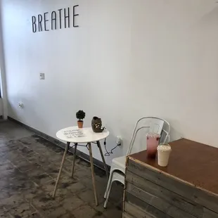 a table with a drink on it
