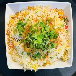 a bowl of rice and vegetables
