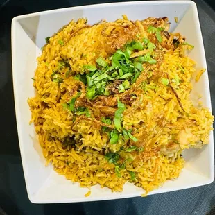 a bowl of rice and vegetables