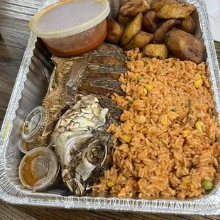 Liberian jollof rice (riz au gras) with tilapia