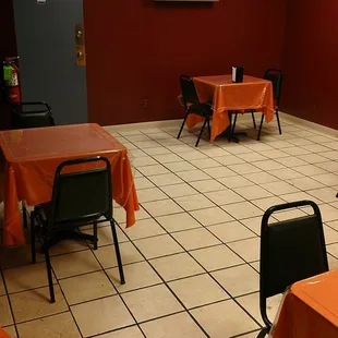 tables with orange tablecloths