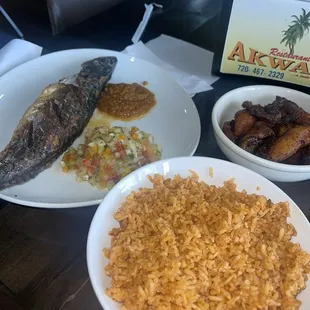 Fried mackerel, jollof rice and plantains