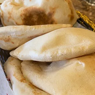 Freshly baked pita breads. Keep them coming!