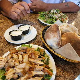 Chicken shwarma fattoush salad, puffy bread w/garlic dip, meat shwarma salad