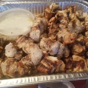 Grilled chicken with a side of garlic sauce. Bomba!