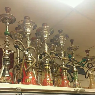 a variety of hook - ons on a shelf