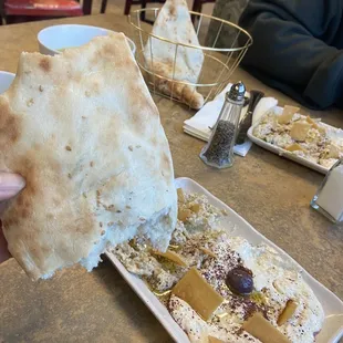 Warm bread with some babaganoush I believe