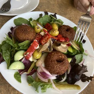 Salad with falafel  - next time I will order the falafel appetizer itself because it&apos;s that good