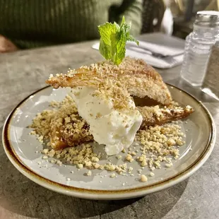 Baklava Sundae - layered filo dough stuffed with walnuts and ice cream, topped with syrup