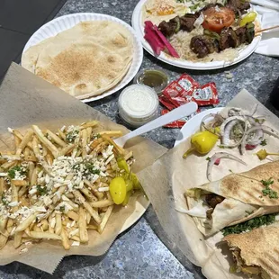 Beef Tenderloin Kabab Plate, Greek Fries with Feta Cheese, Xl Chicken Shawarma Sandwich.