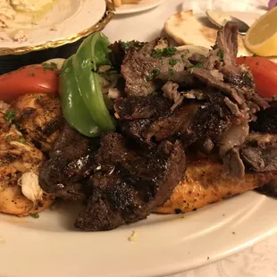 Combination platter with chicken steak and ground beef