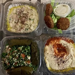 Mixed Appetizers takeout(Baba Ghanouj, falafel, Tabbouli Salad, Grape Leaves, Hummus). It also came with Pita Bread