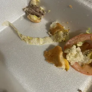 Clorox or some kind of sanitary wipe in my daughters burger. This is what she spit out.