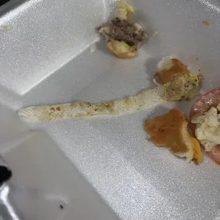 Clorox or some kind of sanitary wipe in my daughters burger. This is what she spit out.