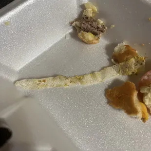 Clorox or some kind of sanitary wipe in my daughters burger. This is what she spit out.