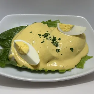 Papa a la Huancaina (cook potatoes with yellow peruvian pepper, cheese, milk)