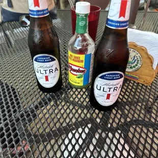 The bottle of hot sauce on each table. (And our Ultras, which were nice and cold.)