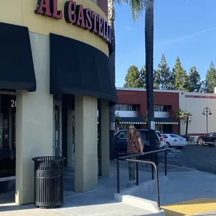 Wife waiting while I park my new ride!