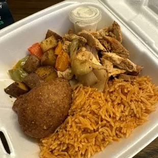 Iraqi Lamb with a side of red rice with chicken...except there&apos;s no lamb.