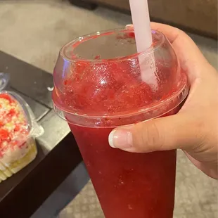 Fresa raspado! They forgot to add coconut and mango. But still really good and refreshing