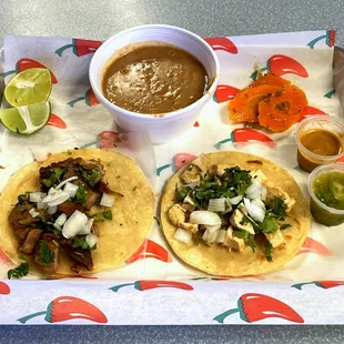 Two Street Tacos (Carnitas and Pollo) with a Side of Beans