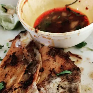 Consume was good but too little for the already small tacos had none after two were gone.