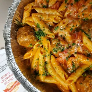 Build Your Own: Penne with Pink Sauce, Meat Balls, Garlic, Roasted Pepper, and Cherry Tomatoes. So delicious!
