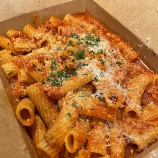 Build your own pasta! Rigatoni, red sauce, sausages, garlic, onion, &amp; chili flakes