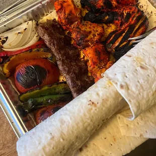 Koobideh , tandoori chicken, chicken kabob and veggie skewer