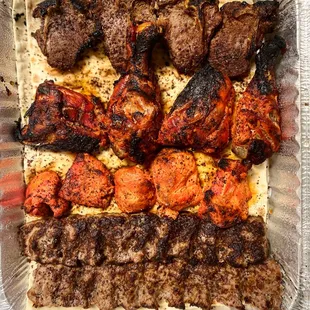 Kubideh, tandoori chicken, Lahori tikka, and lamb chops